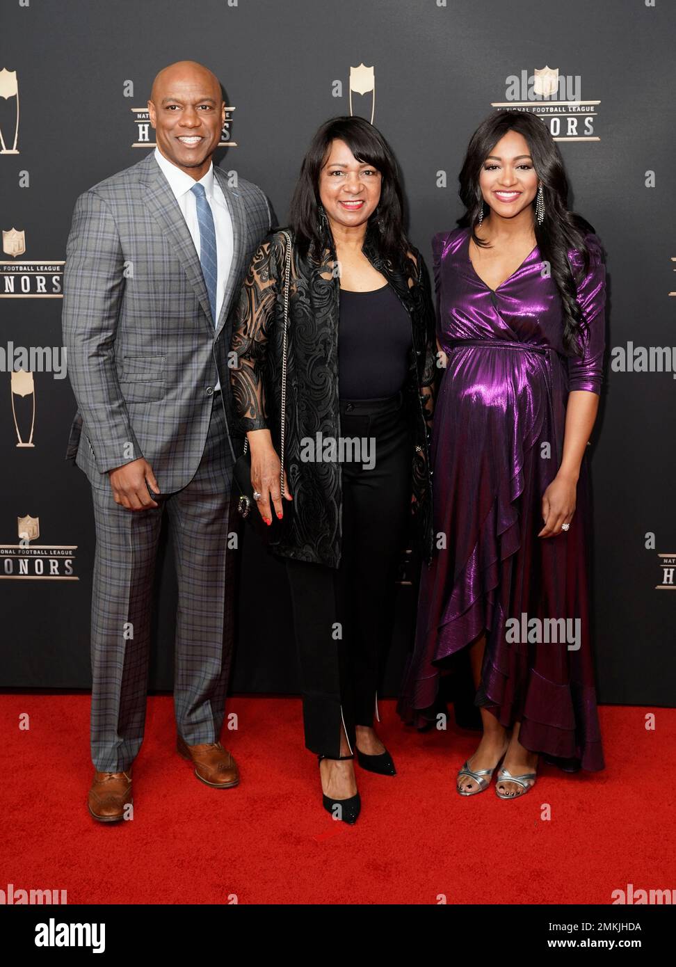 Jarrett Payton, from left, Connie Norwood, and Brittney Payton arrives at  the 8th annual NFL Honors 