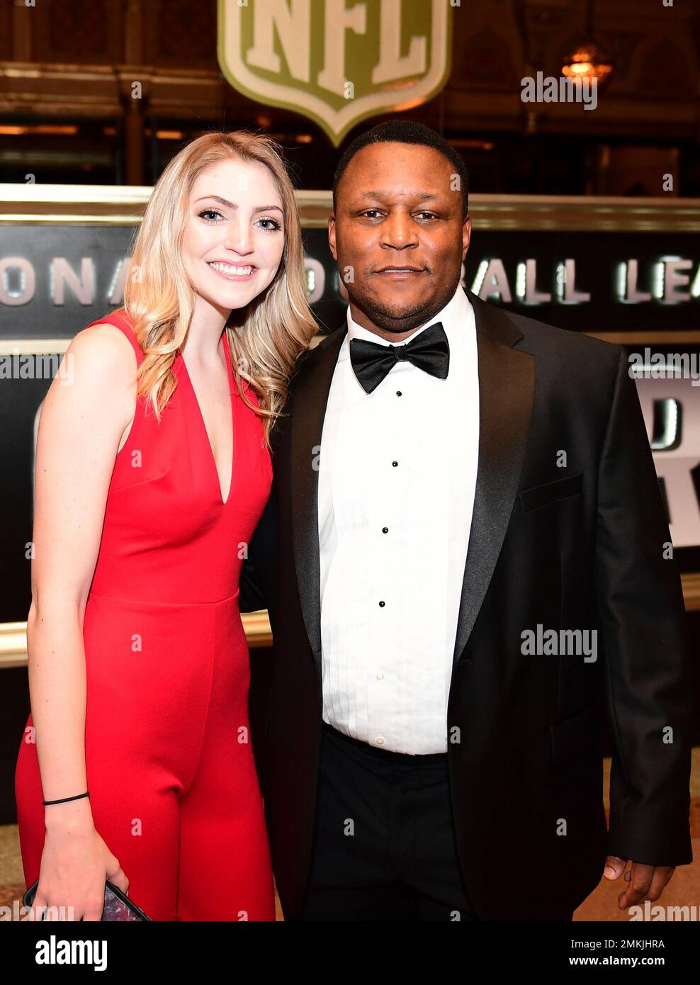 Former NFL player Barry Sanders, right, attends the 8th Annual NFL