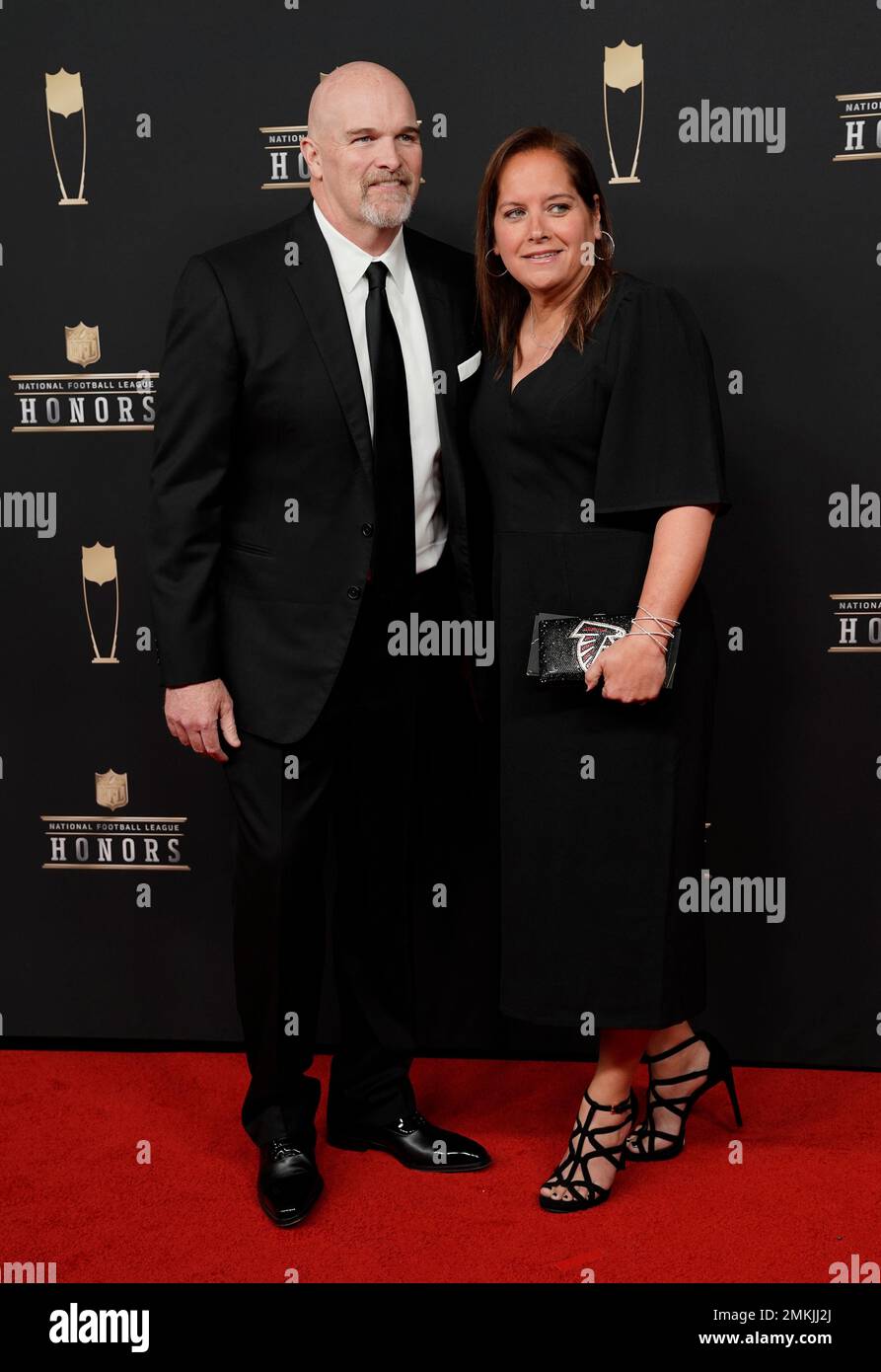 Dan Quinn, coach of the Atlanta Falcons, left, and Stacey Quinn arrive