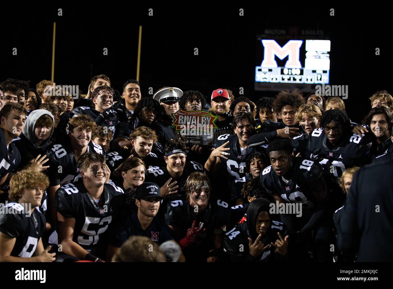 The Milton High School poses after winning the Roswell High School at