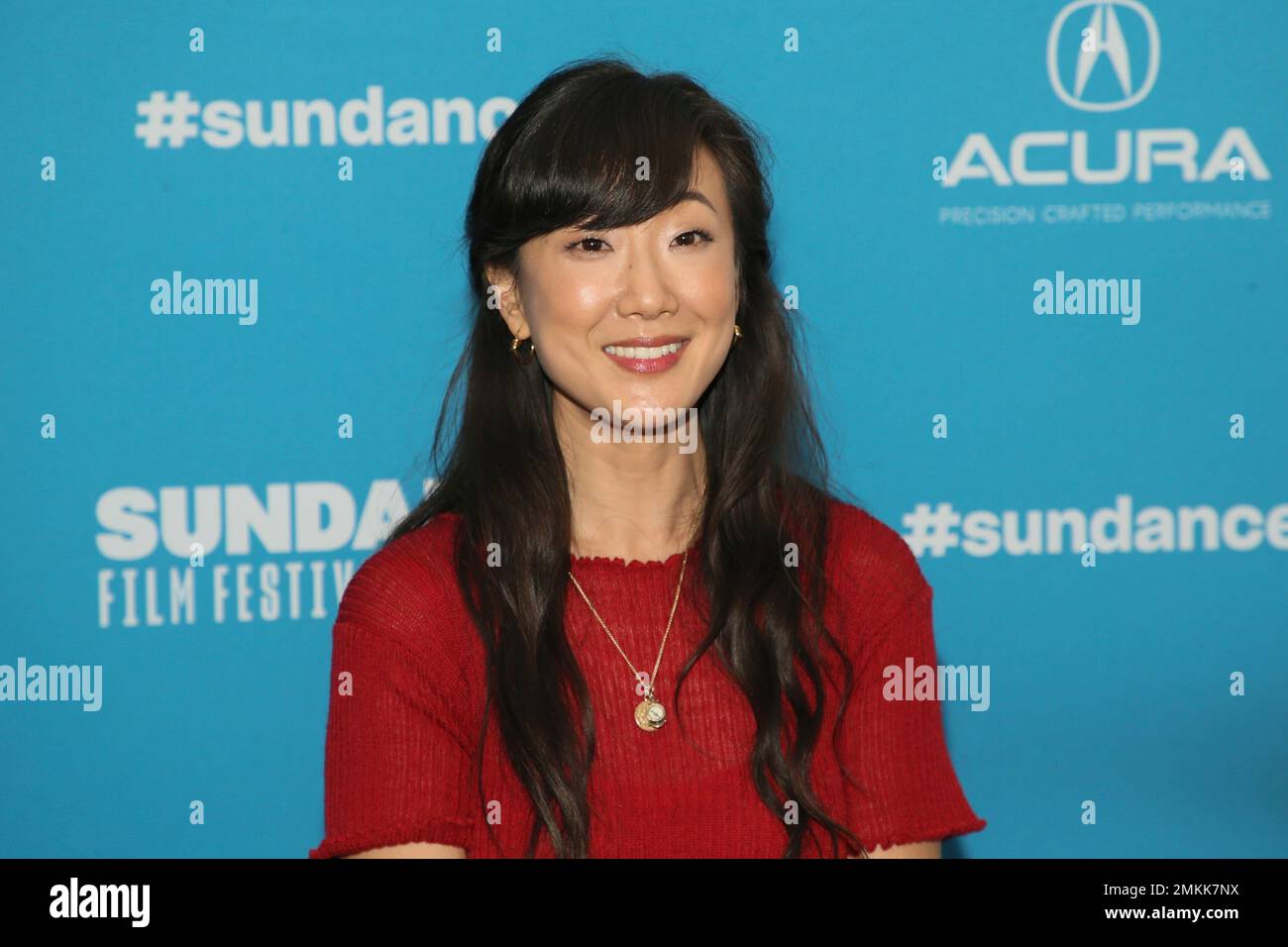 Actress Jennifer Kim poses at the premiere of the film "Corporate