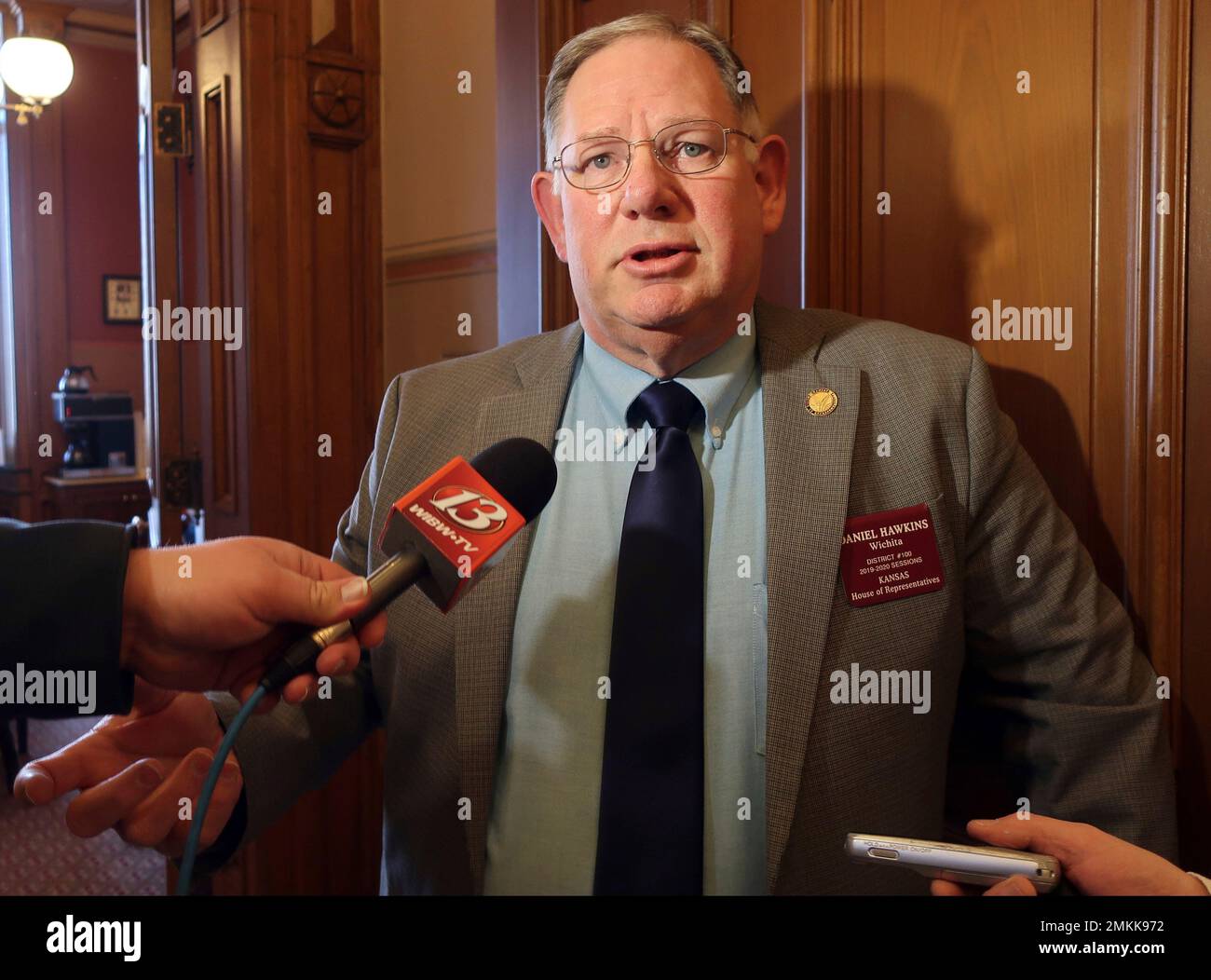 Kansas House Majority Leader Dan Hawkins, RWichita, speaks with