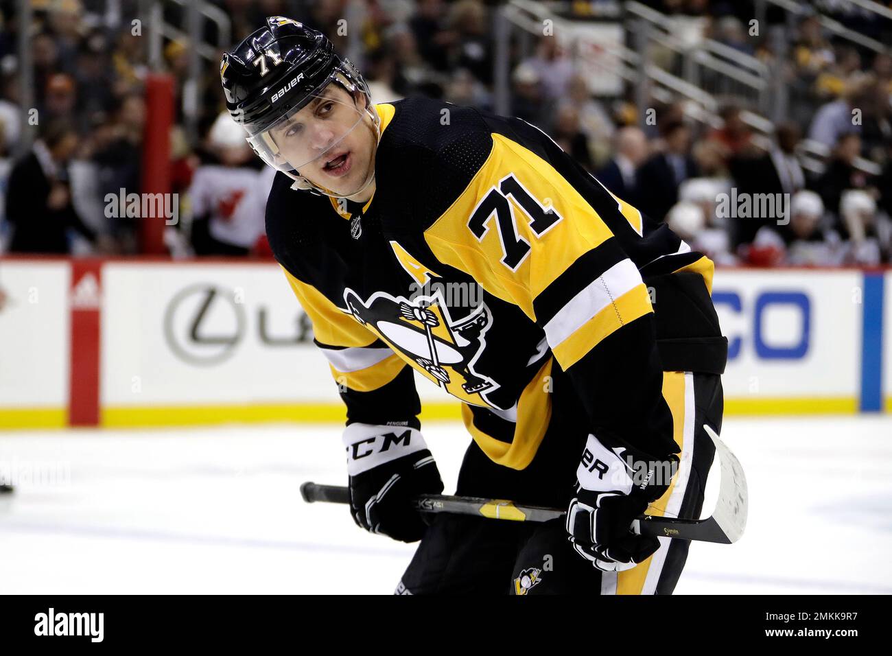 Pittsburgh Penguins' Evgeni Malkin prepares to take a face-off