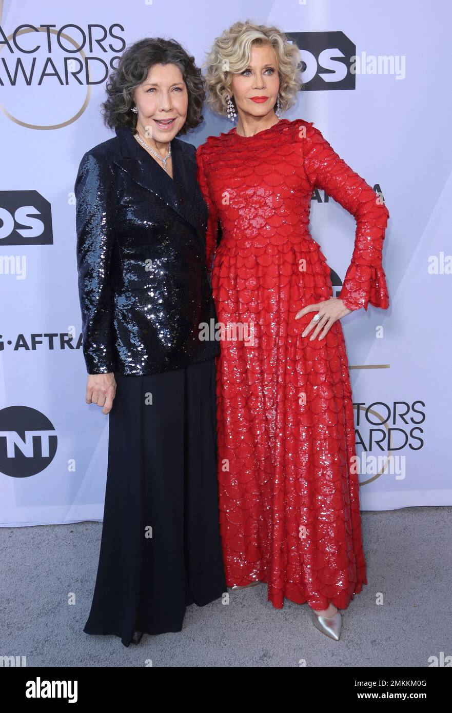 Lily Tomlin, left, and Jane Fonda arrive at the 25th annual Screen