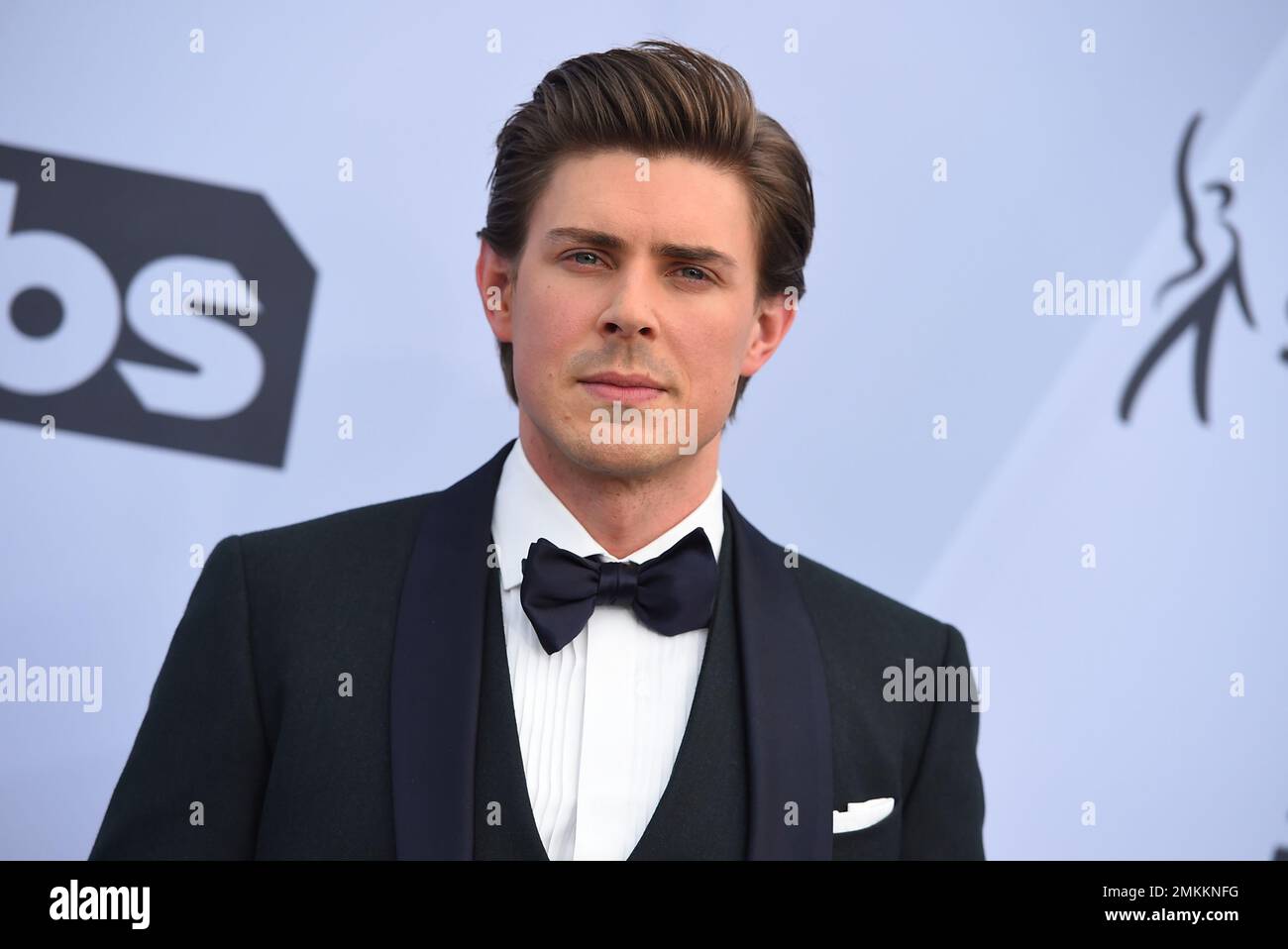 Chris Lowell arrives at the 25th annual Screen Actors Guild Awards at ...