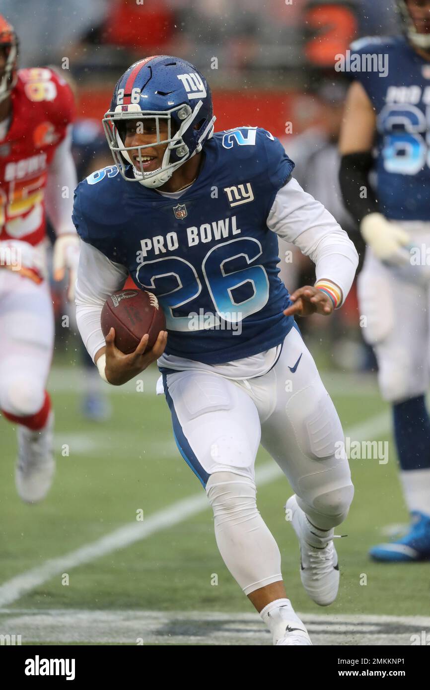 NFC running back Saquon Barkley 26 in action against the AFC during