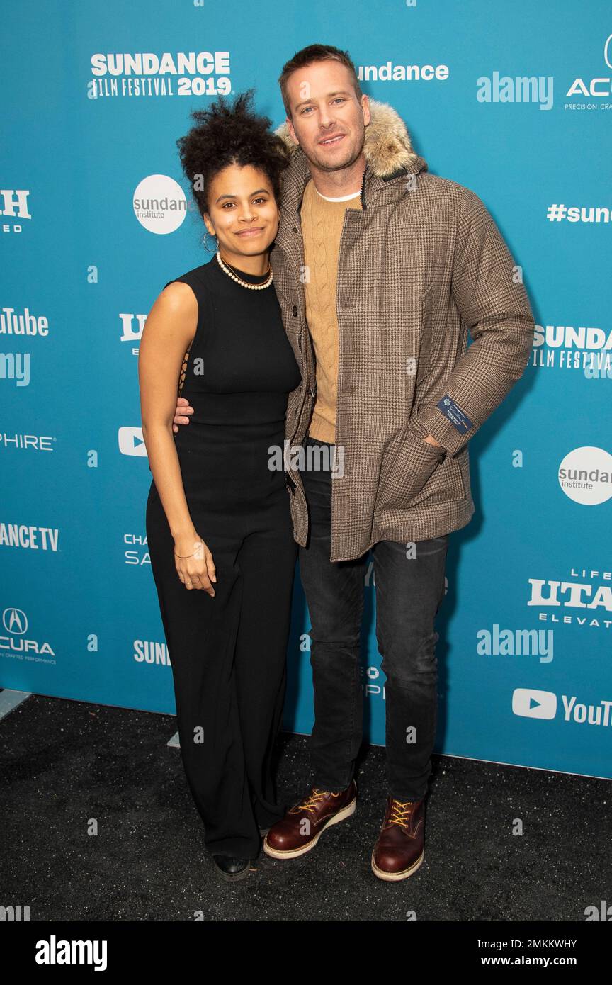 Actors Zazie Beets, left, and Armie Hammer pose at the premiere of