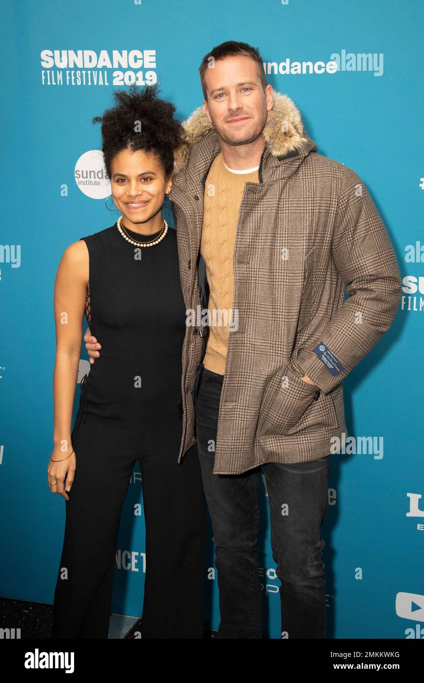 Actors Zazie Beets, left, and Armie Hammer pose at the premiere of