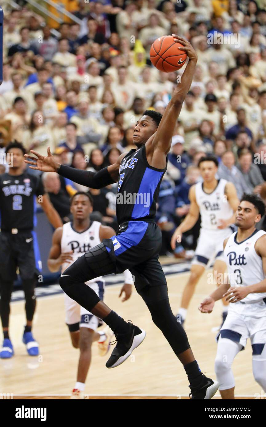 Duke's RJ Barrett (5) goes up for a dunk on a break away in front of  Pittsburgh's Malik Ellison (3) during the second half of an NCAA college  basketball game, Tuesday, Jan.