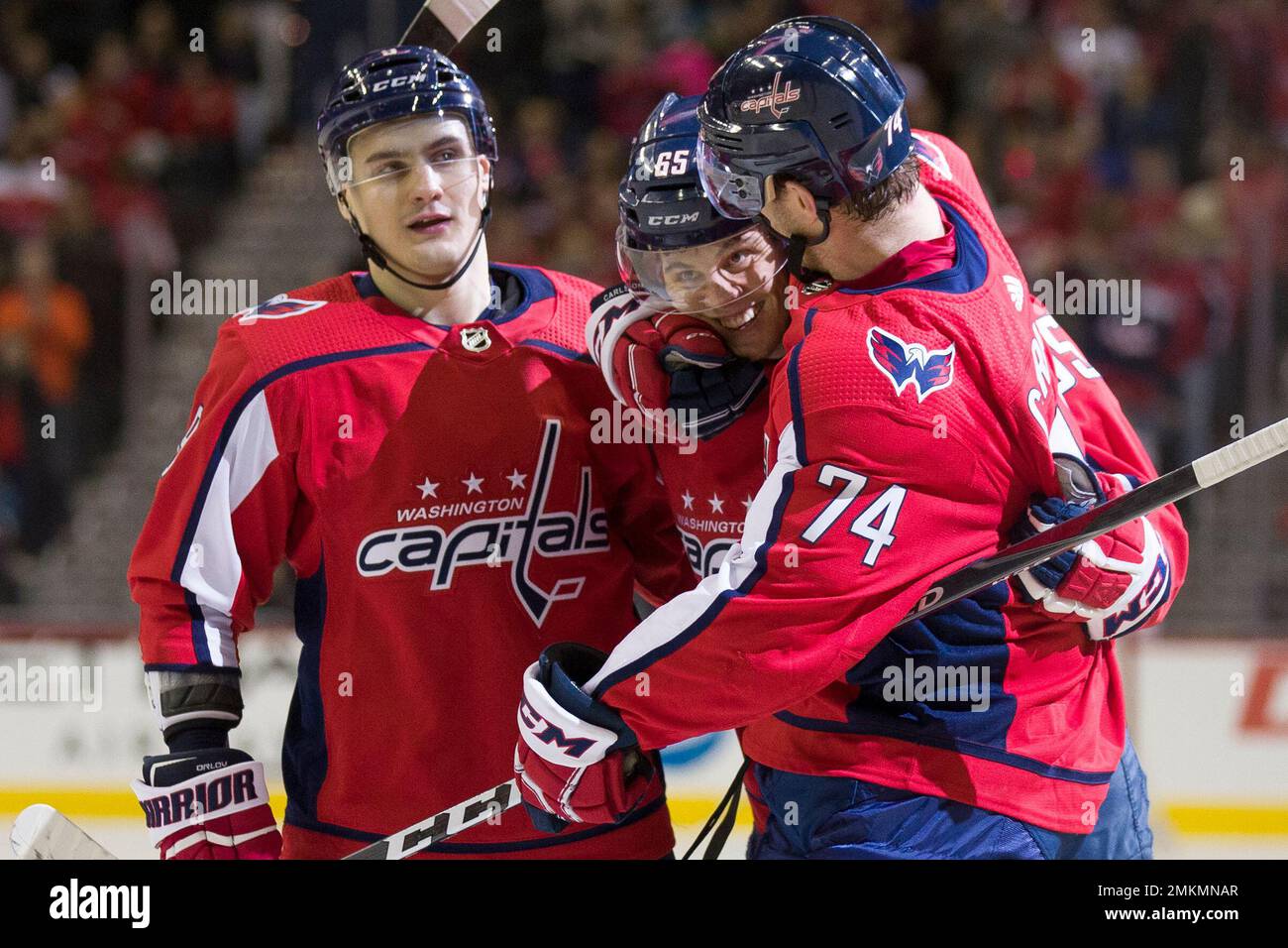 Washington Capitals left wing Andre Burakovsky (65) and defenseman John  Carlson celebrate after the Capitals defeated the Tampa Bay Lightning 4-0  during Game 7 of the NHL Eastern Conference finals …
