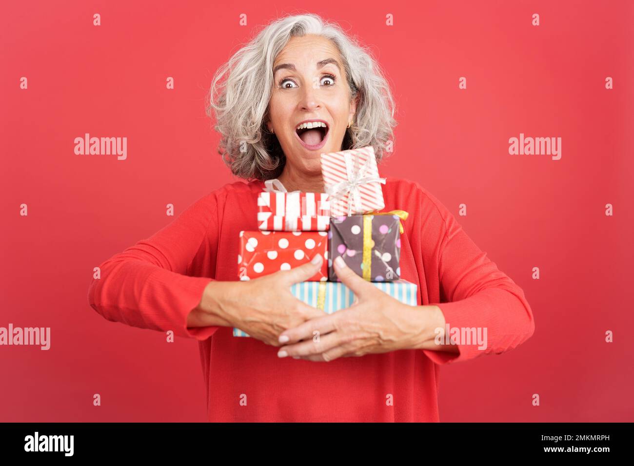 Excited mature woman hi-res stock photography and images - Alamy