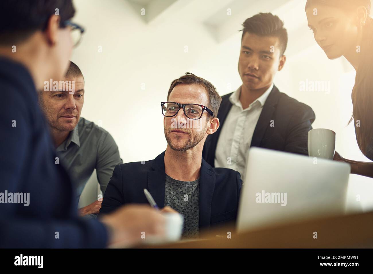 Teamwork is essential to business achievement. a group of coworkers ...
