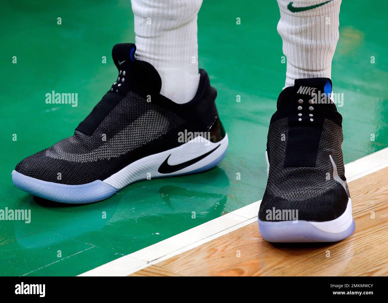 The auto-lacing Nike HyperAdapt BB shoes of Boston Celtics' Jayson Tatum  are seen as he warms up before their NBA basketball game against the Miami  Heat Monday, Jan. 21, 2019, in Boston. (