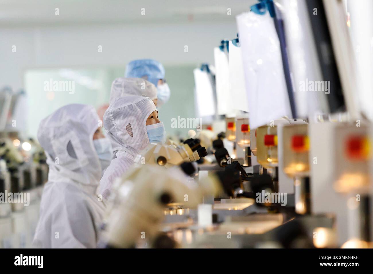 SUQIAN, CHINA - JANUARY 29, 2023 - Workers make electronic chips at a workshop in Suqian, East China's Jiangsu Province, Jan 29, 2023. (Photo by CFOTO/Sipa USA) Stock Photo