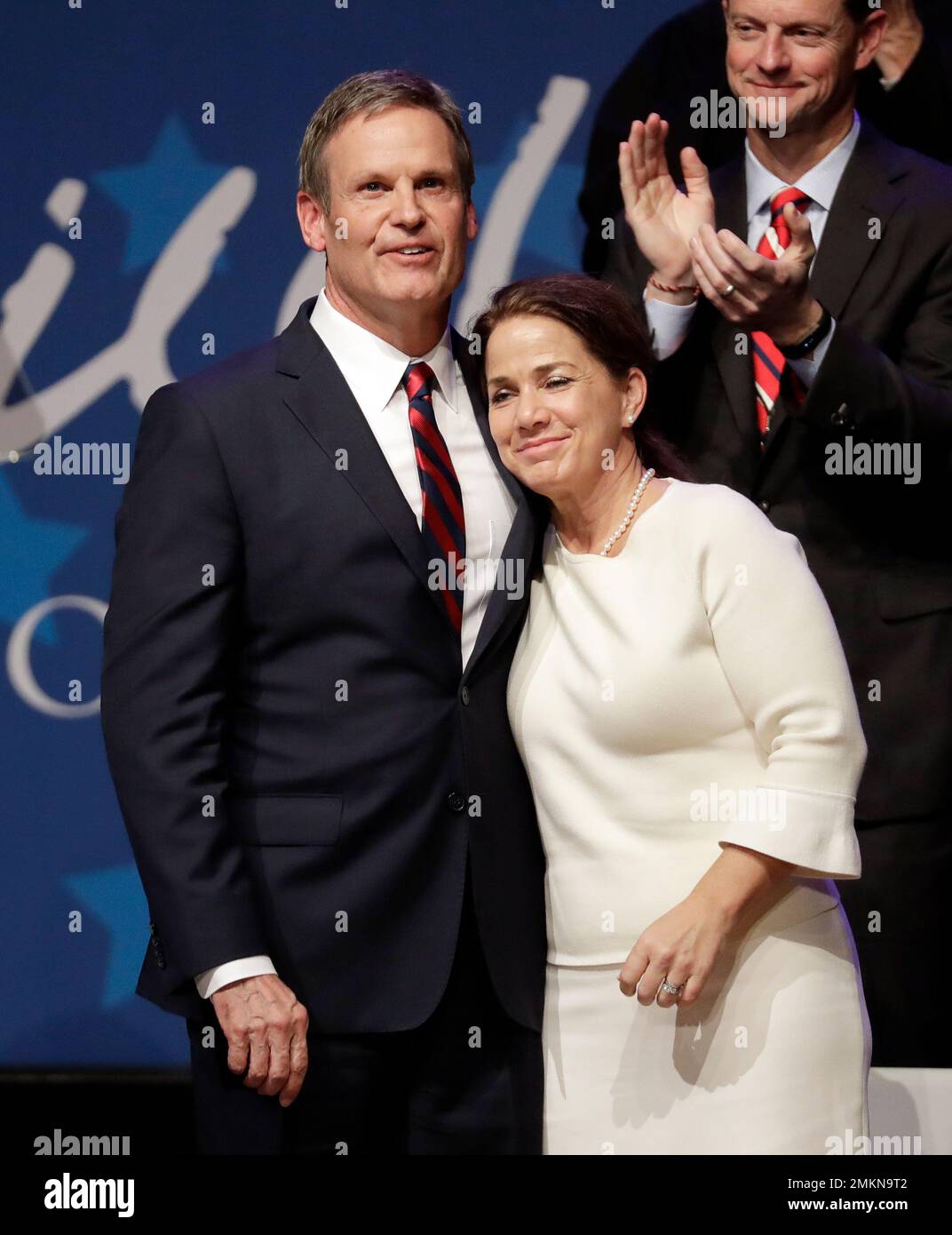 Maria Lee, wife of Tennessee Gov. Bill Lee, walks onto the stage to join  her husband after he was declared the winner in his bid for re-election  Tuesday, Nov. 8, 2022, in