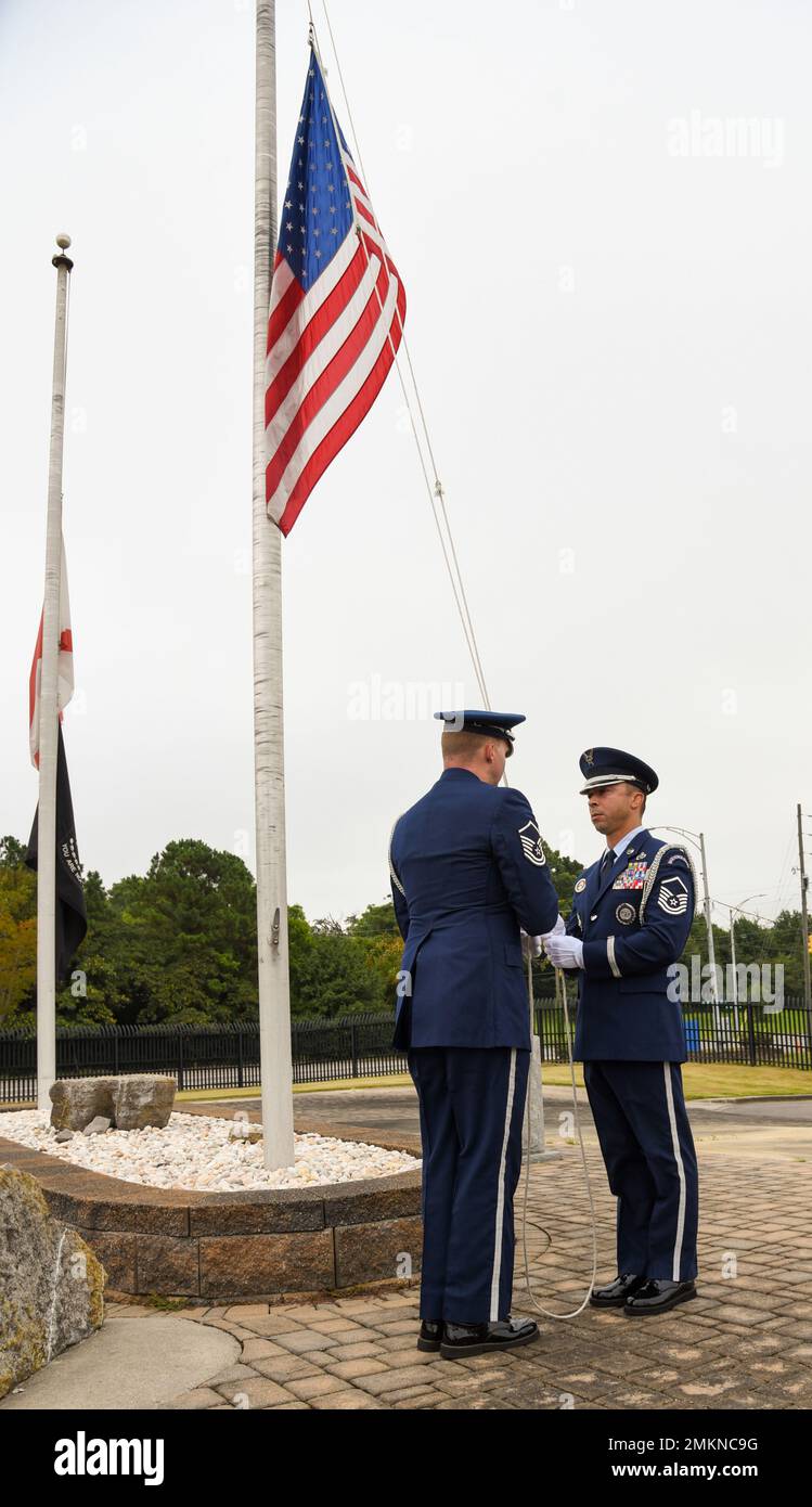 117th Air Refueling Wing Members participate in a 9/11 remembrance at Sumpter Smith Joint National Guard Base, Alabama, Sept. 11, 2022. Chaplain (Capt.) Eric Guiffreda led wing members in prayer. Stock Photo