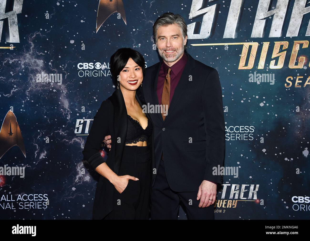 Actor Anson Mount, right, and wife Darah Trang attend the "Star Trek