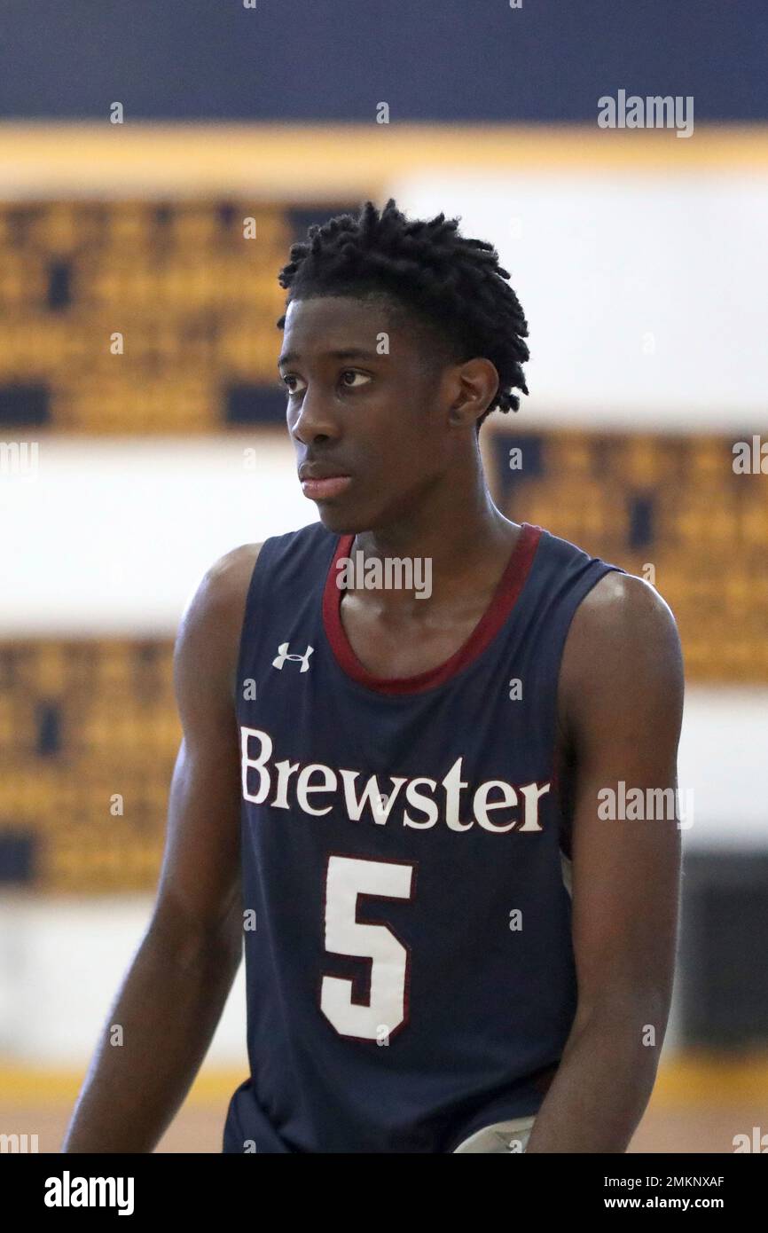 Brewster Academy's Terrence Clarke 5 in action against Westtown School