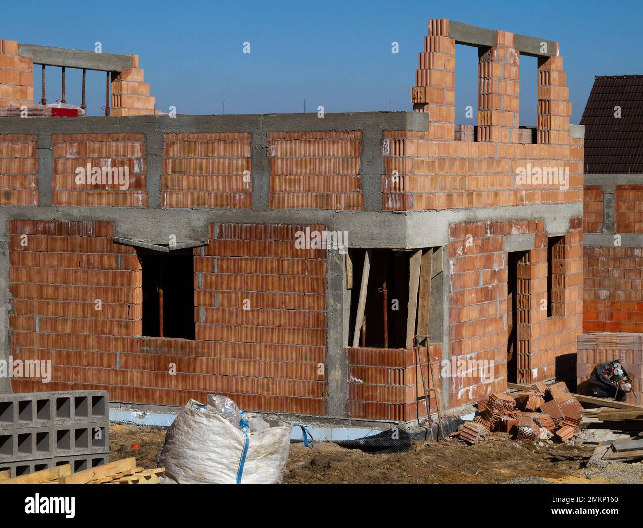 Singlefamily home made of hollow blocks or bricks. New unfinished