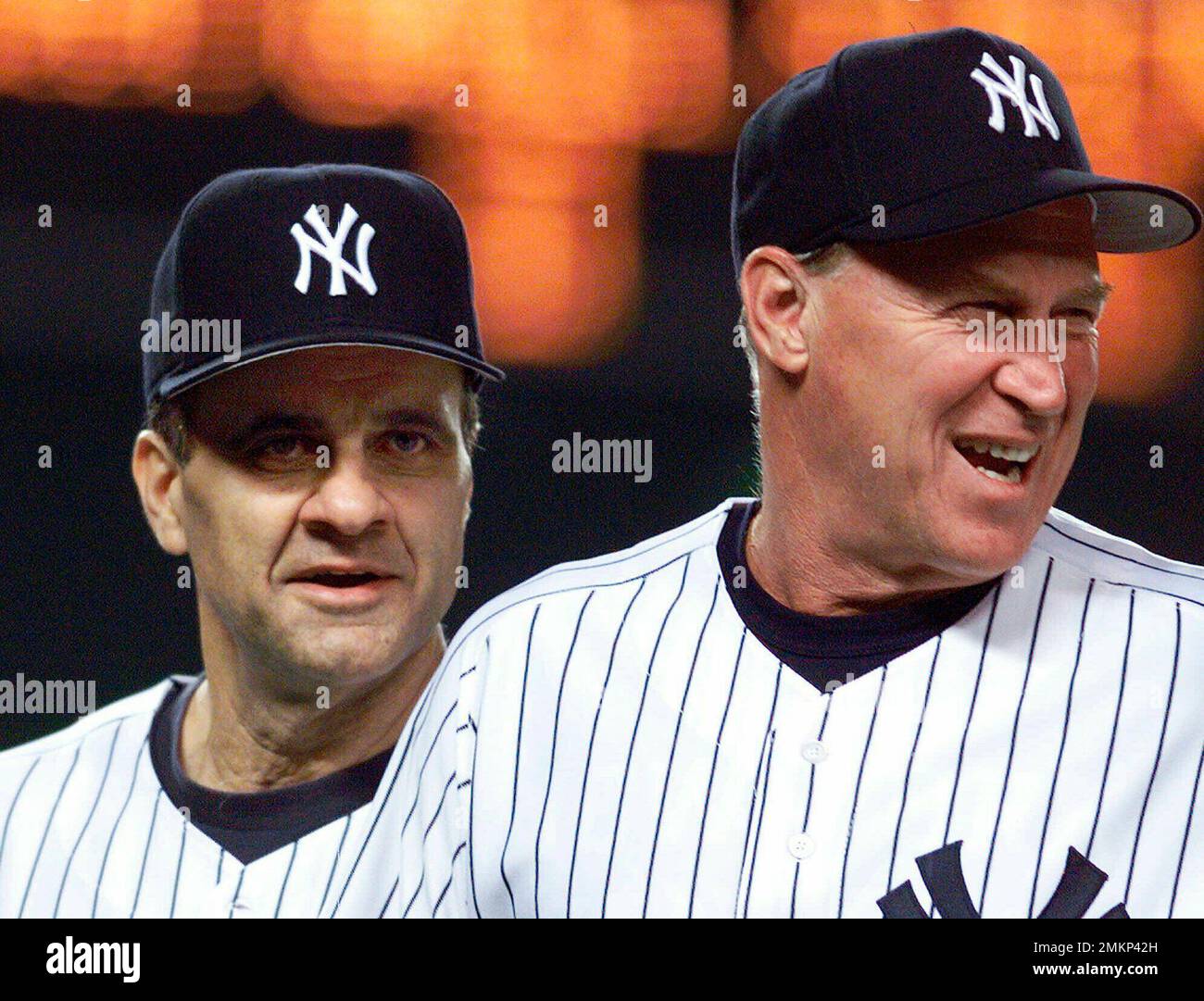 FILE In this Aug. 27 1999 file photo New York Yankees manager Joe Torre left and pitching coach Mel Stottlemyre head onto the field to congratulate their players after the Yankees