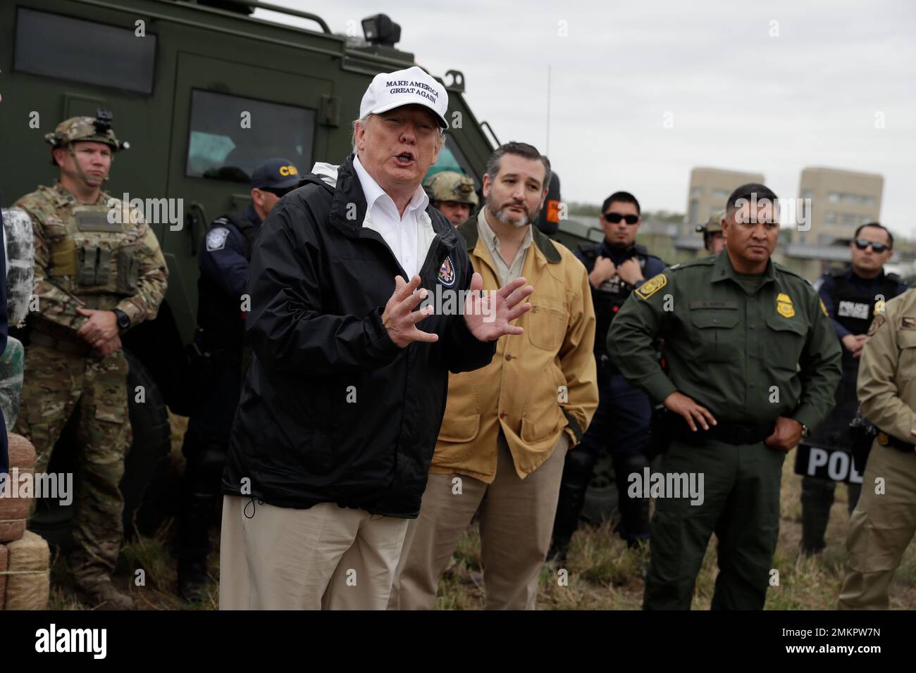 President Donald Trump speaks to the media as he tours the U.S. border ...