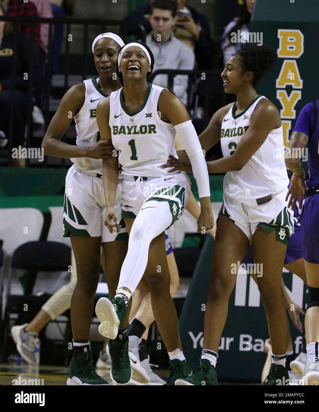 Baylor forward NaLyssa Smith (1) celebrates a point against Kansas