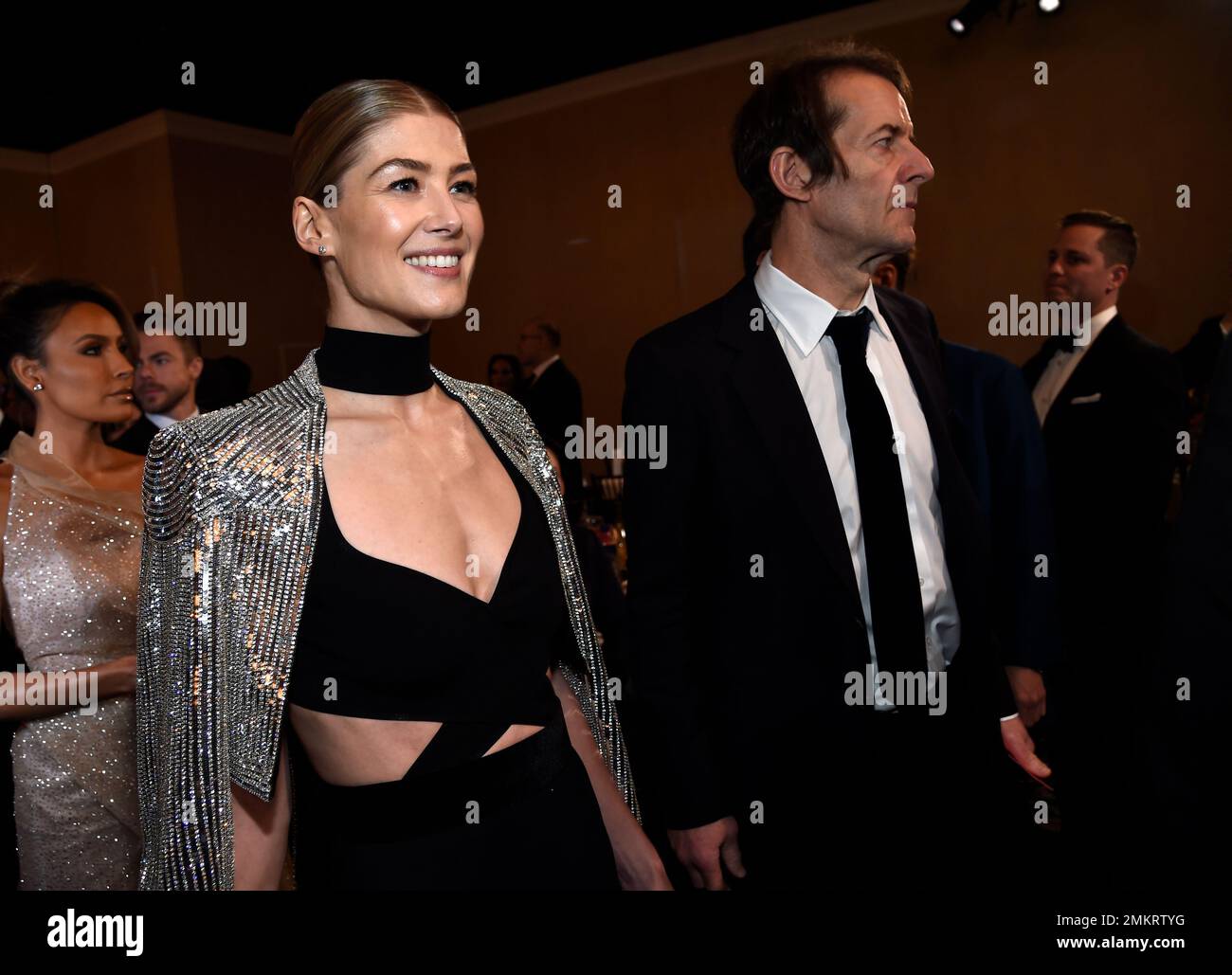 rosamund-pike-left-and-robie-uniacke-attend-the-76th-annual-golden