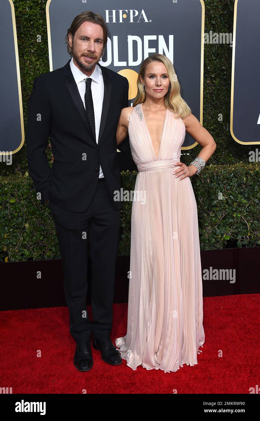 Dax Shepard, left, and Kristen Bell arrive at the 76th annual Golden