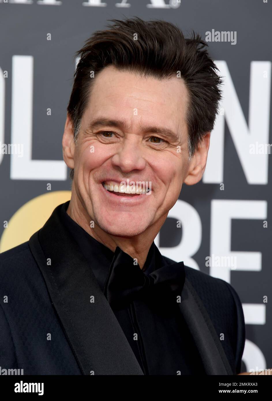 Jim Carrey arrives at the 76th annual Golden Globe Awards at the