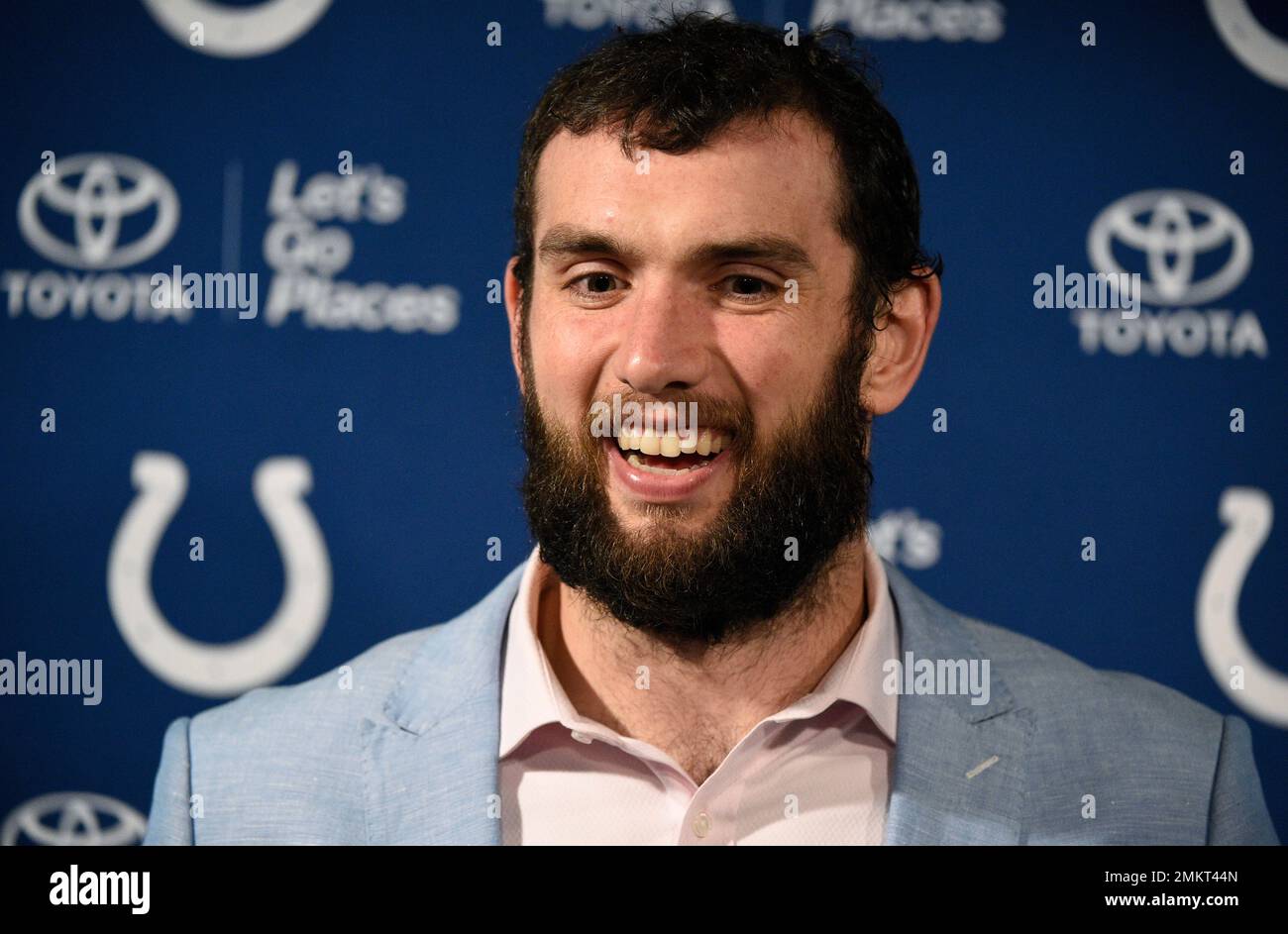 Indianapolis Colts quarterback Andrew Luck talks with the media