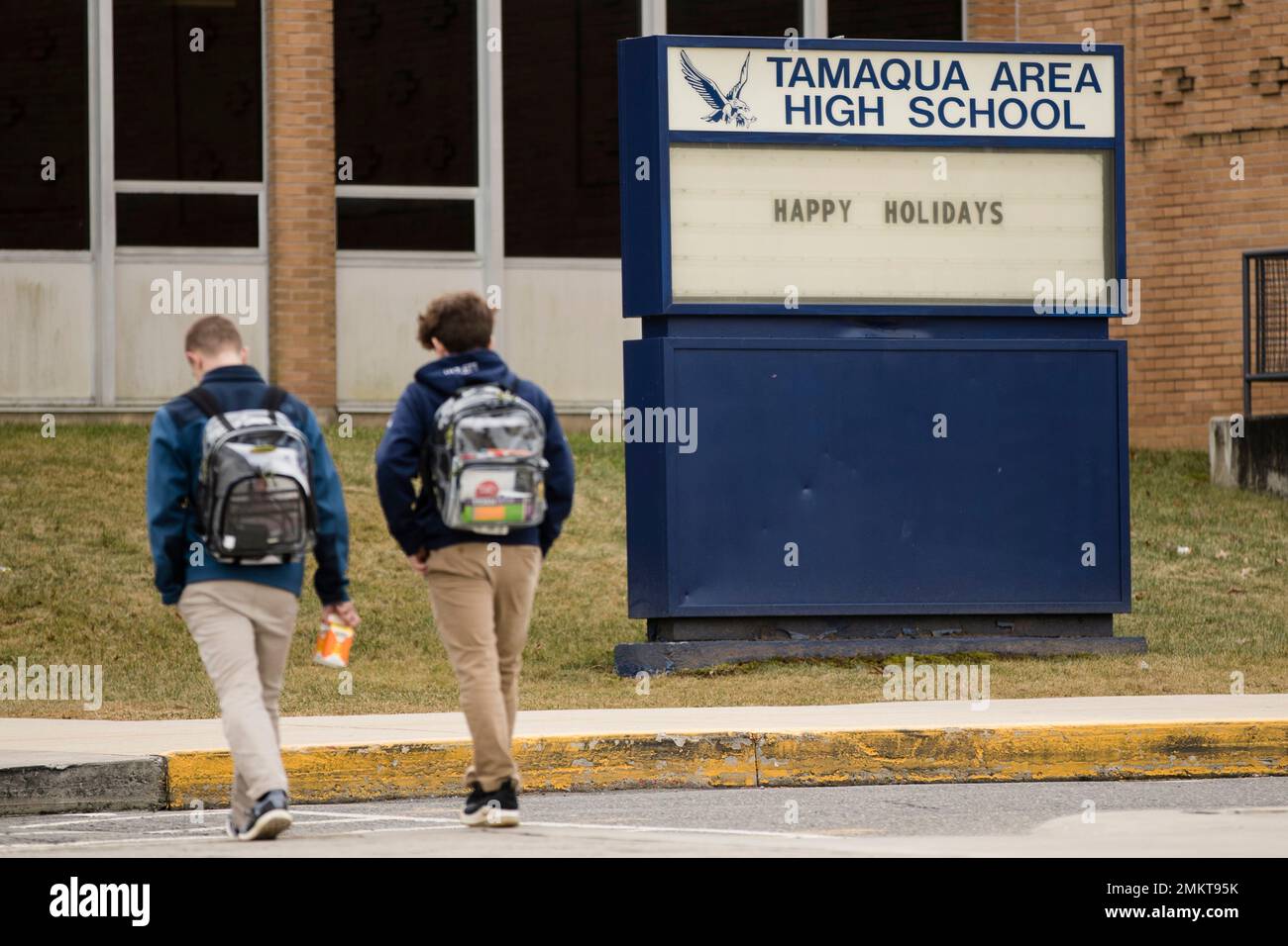 Students walk to Tamaqua Area High School in Tamaqua, Pa., Friday, Jan