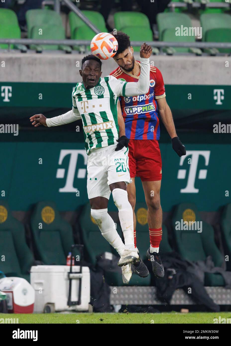 Fortune Bassey of Ferencvarosi TC battles for the ball in the air News  Photo - Getty Images