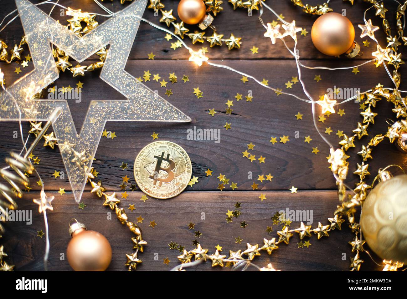 Bitcoin coin in the festive decor for Christmas and new year. Cryptocurrency,  finance, wealth and investing. Fairy lights, greeting card Stock Photo -  Alamy