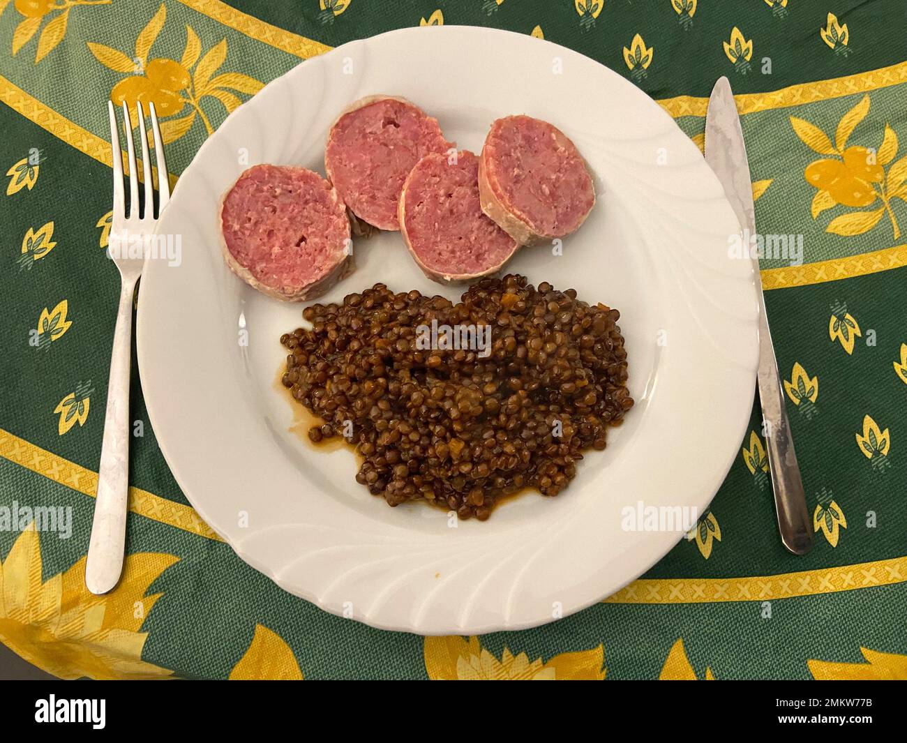 Cotechino (italian pork sausage) and lentils, traditional New Year's Eve dish Stock Photo Alamy