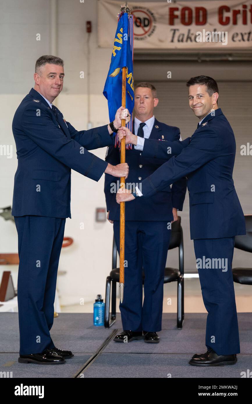 Col. Hans F. Otto, right, accepts the guidon of the 123rd Medical Group from Col. Bruce Bancroft, commander of the 123rd Airlift Wing, during a change-of-command ceremony at the Kentucky Air National Guard Base in Louisville, Ky., Sept. 11, 2022. Otto is replacing Col. Michael A. Cooper, who has served as the group’s commander since 2014 and is retiring. Stock Photo