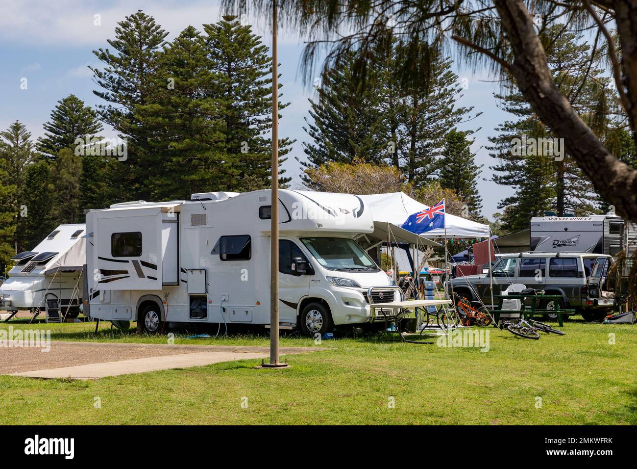 Motorhome and australian flag flying at Sydney campsite camping