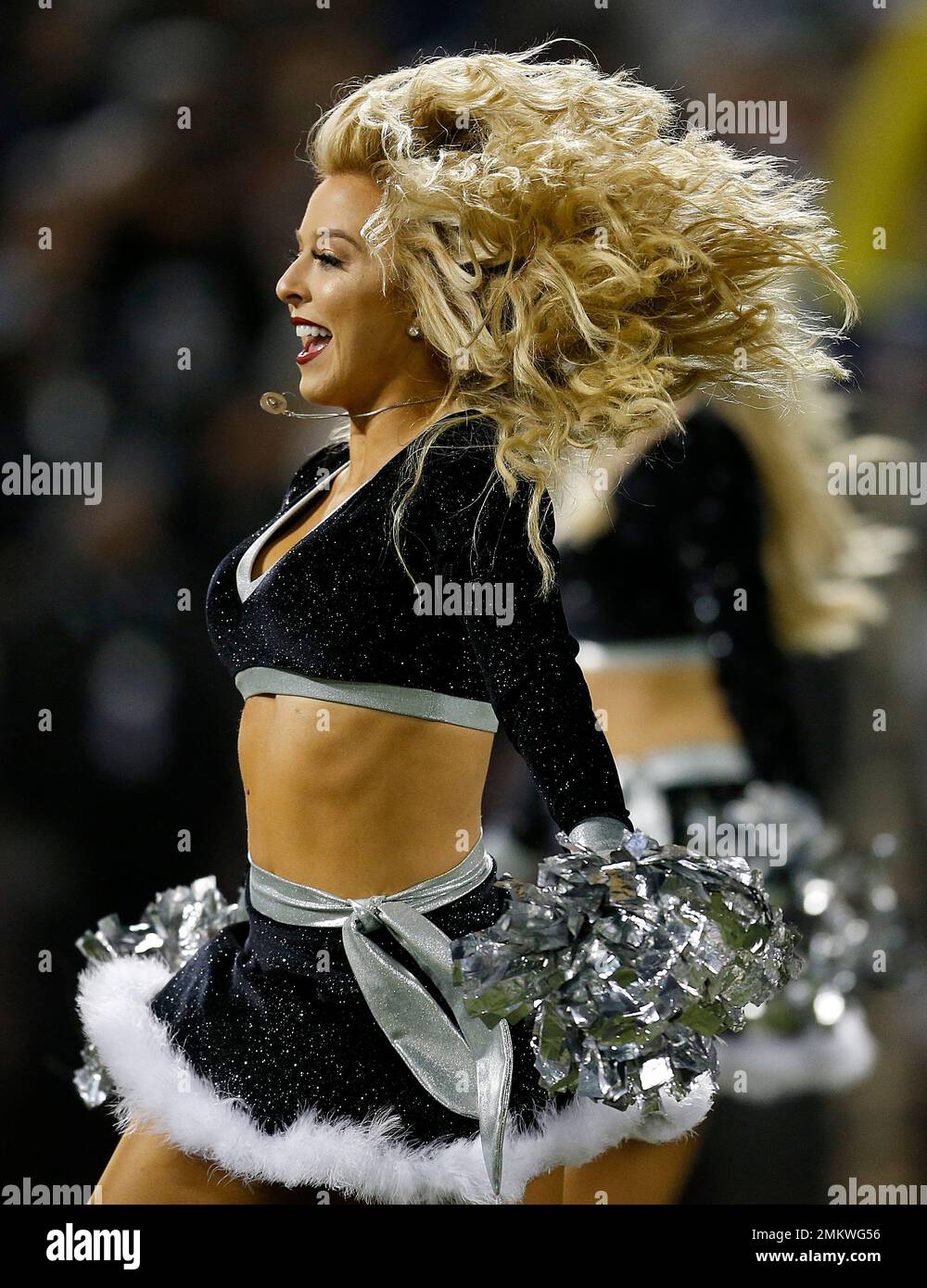 Oakland Raiders cheerleaders perform during the first half of an