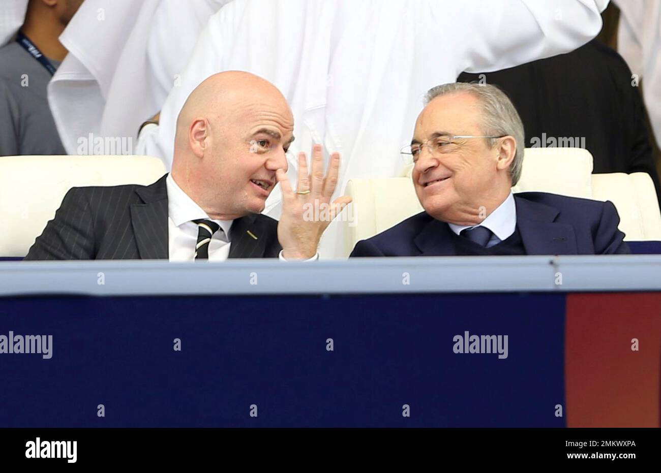 FIFA President Gianni Infantino talks with Real Madrid President Florentino  Perez, right, during the Club World Cup final soccer match between Real  Madrid and Al Ain at Zayed Sport City in Abu