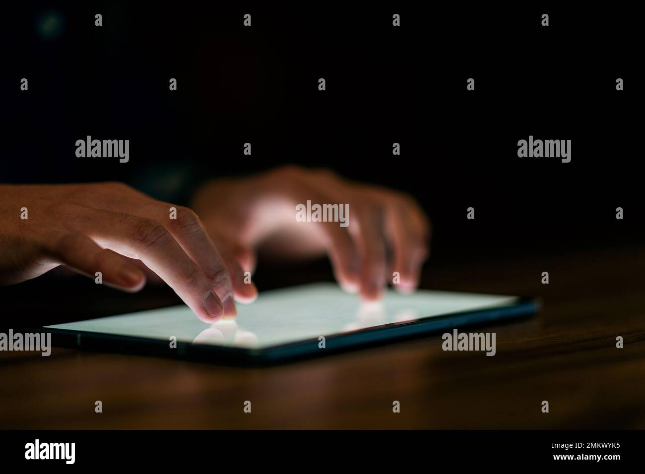 Unrecognizable guy touching empty blank digital pad screen Stock Photo