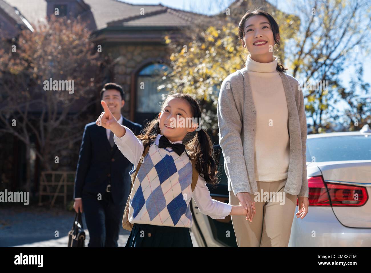 Chinese parents pick up their children from school hi-res stock ...