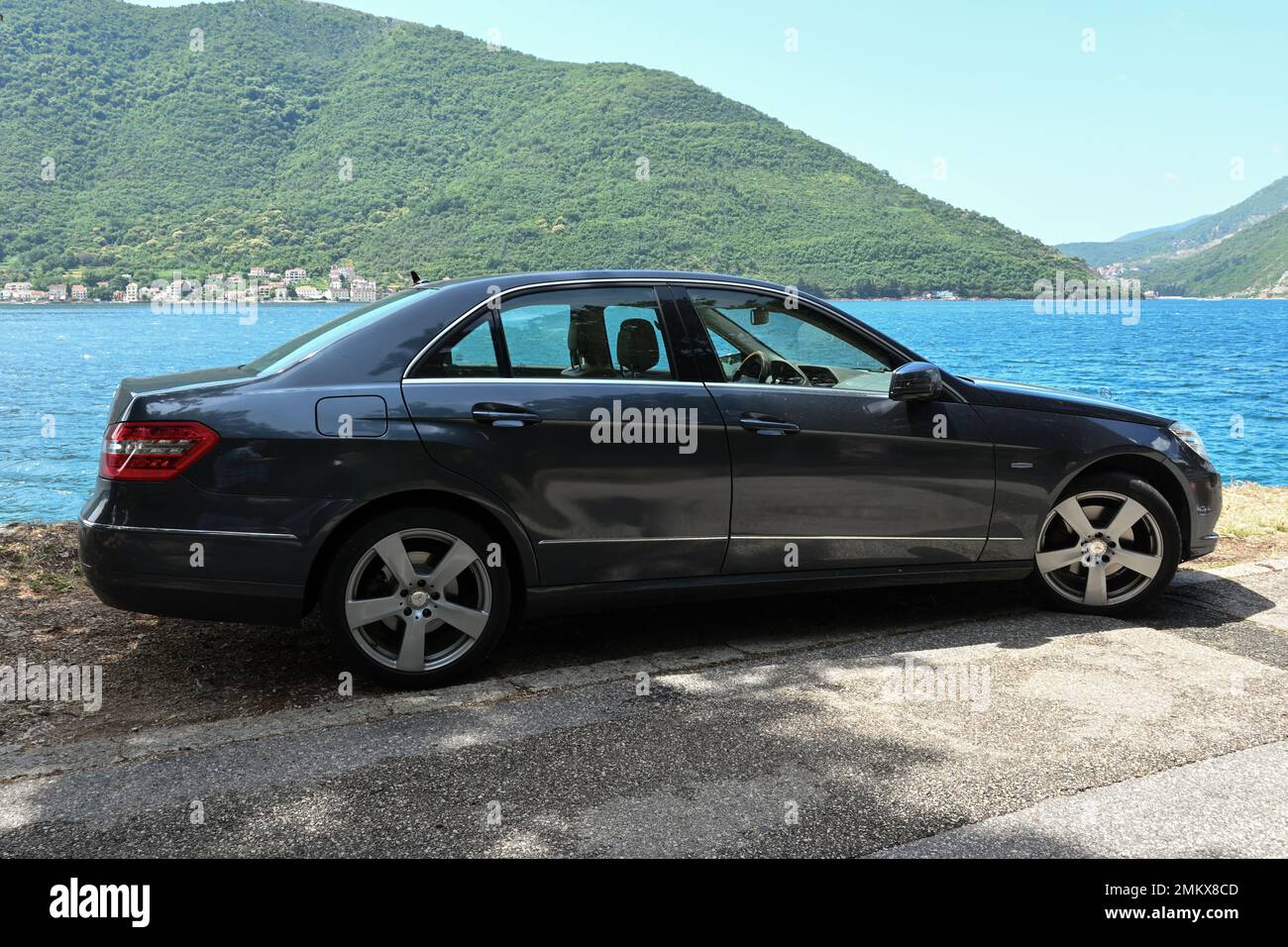Perast, Montenegro June , 2022 Mercedes Benz car parked on the coast