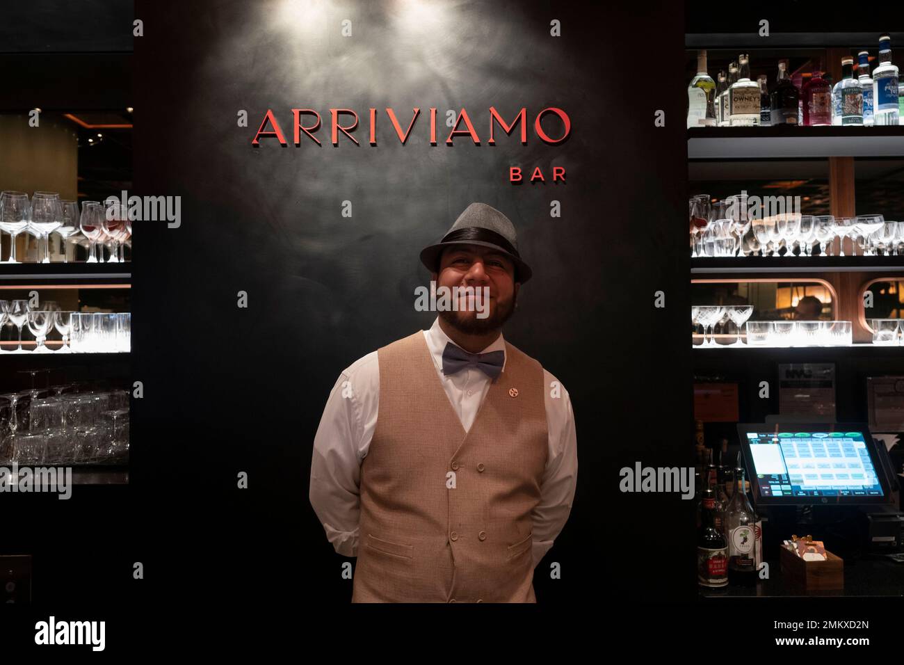 A mixologist poses at the Arriviamo Bar in the new Starbucks Reserve