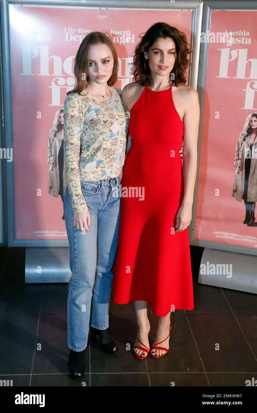 Actresses Lily Rose Depp, left, and Laetitia Casta pose for