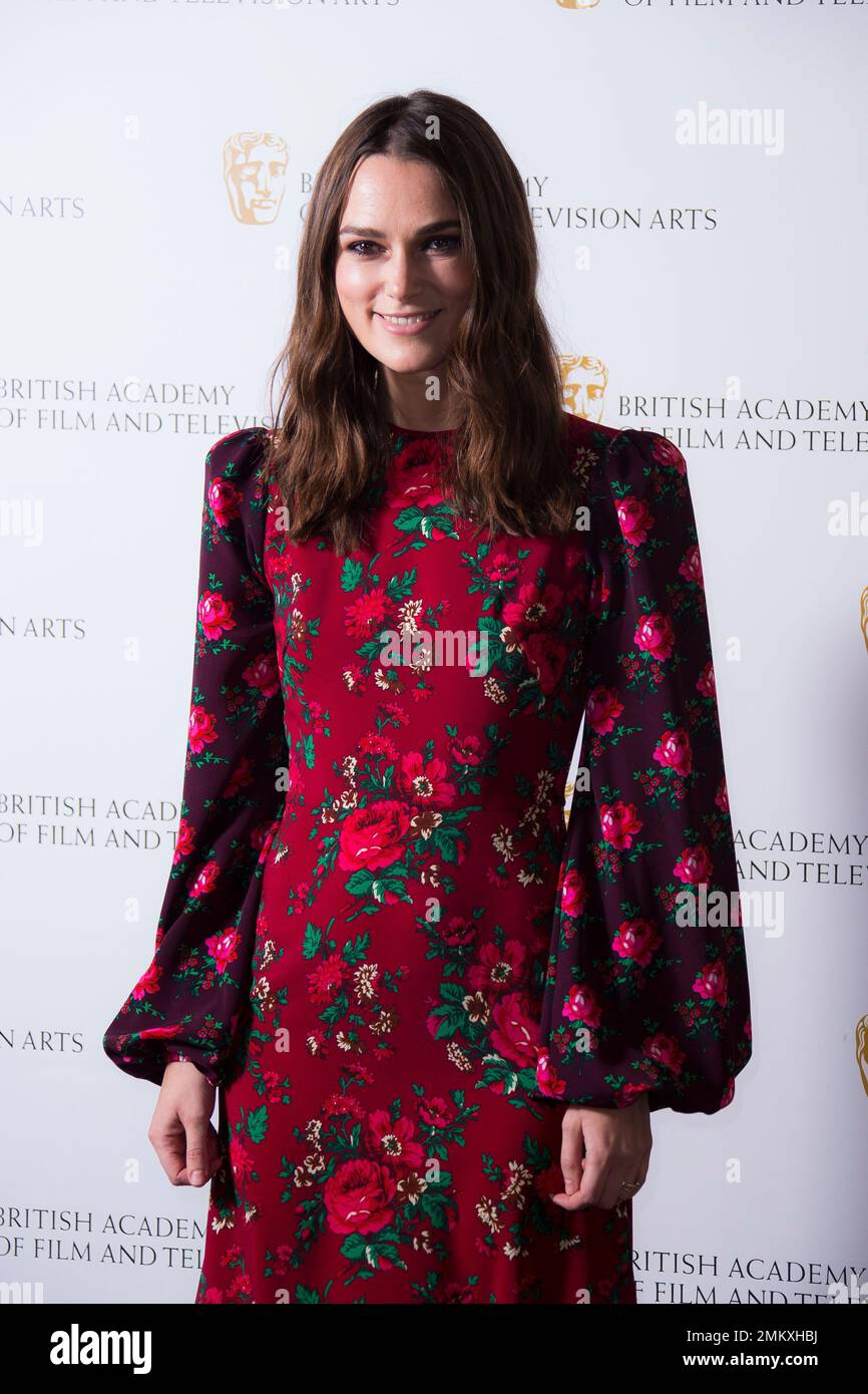 British actress Keira Knightley poses for photographers upon arrival