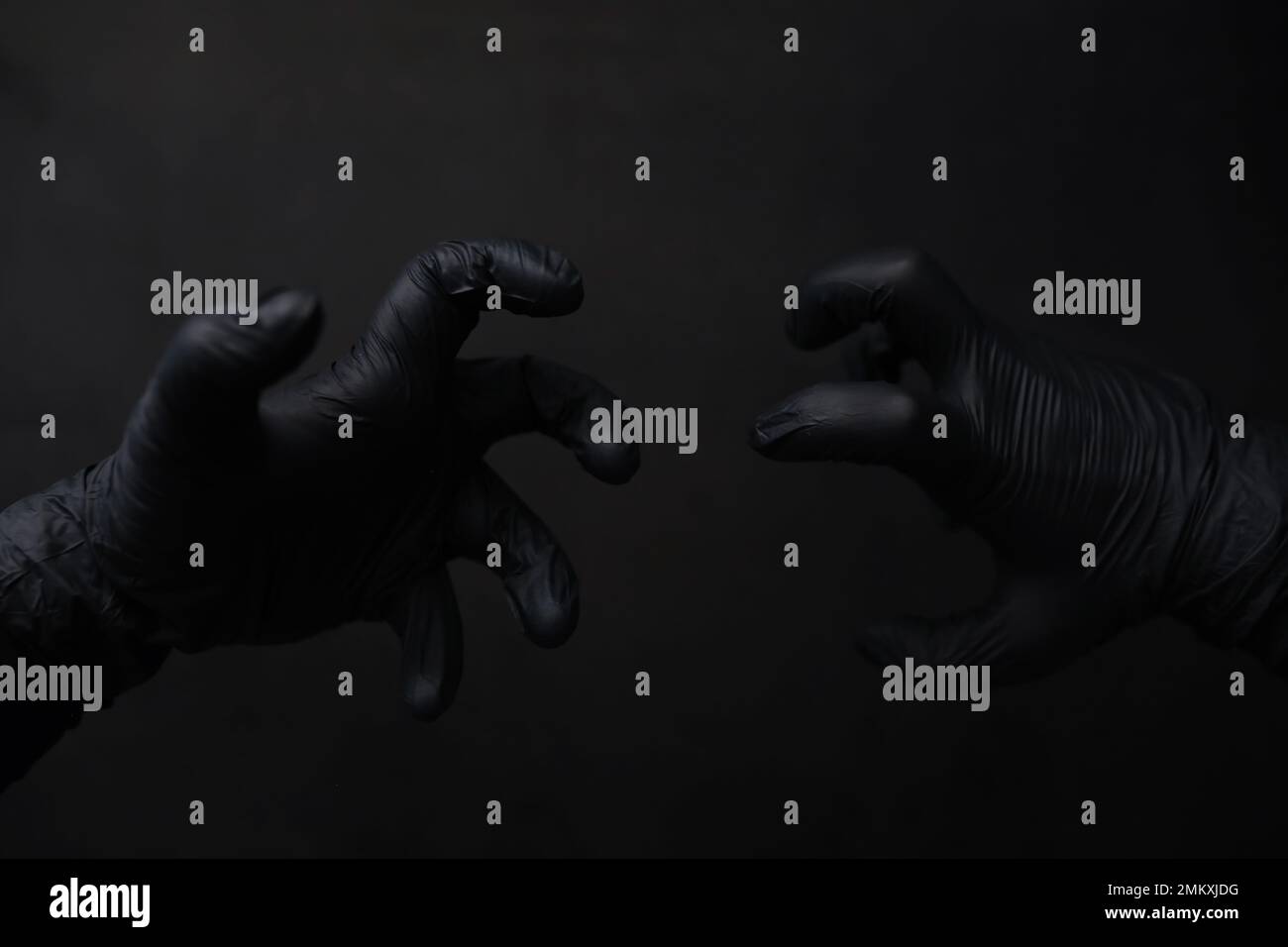 Background of hands in gloves. Black gloves. Hand gestures black gloves ...