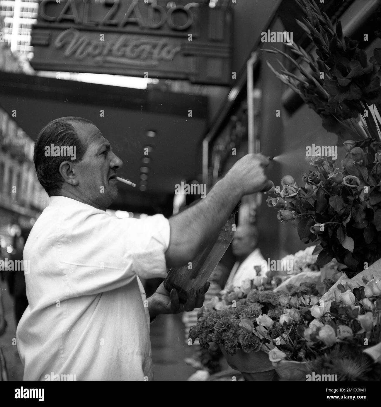 Flower vendor at work, Florida Street, Buenos Aires, Argentina, vintage