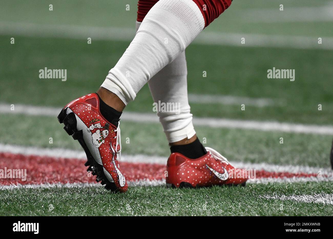 Atlanta Falcons wide receiver Justin Hardy (14) celebrates with Mohamed  Sanu (12) after his 5-yard touchdown pass over the Arizona Cardinals during  the second half of an NFL game at Mercedes-Benz Stadium