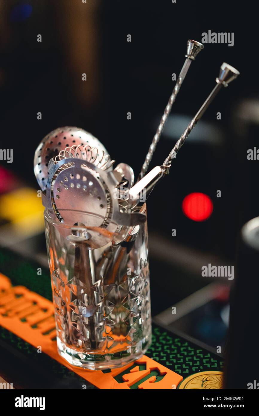 accessories of a bartender for preparation of an alcoholic cocktail