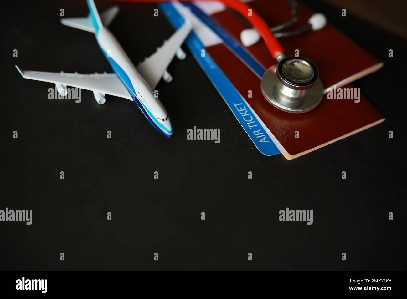 Passenger air insurance concept. Airplane, passport, boarding pass