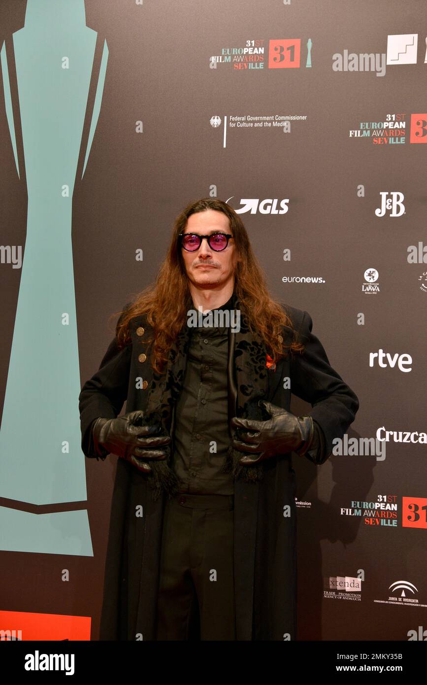 Spanish actor Enrique Alcides poses at the red carpet during the